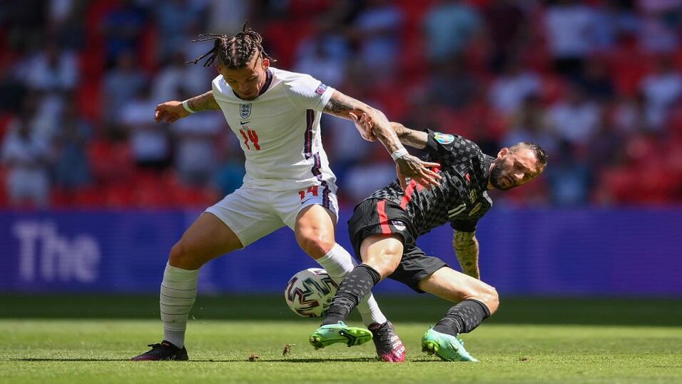 England's Kalvin Phillips competes with Croatia's Marcelo Brozovic